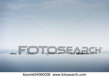 "Cockle pickers with their boats, Vembanad Lake, Kerala, India, Asia" View Large Photo Image Stock Photograph - "Cockle pickers with their boats, Vembanad Lake, Kerala, India, Asia". Fotosearch