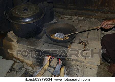 "Coffee beans are hand-roasted over a wood fire, Bali, Indonesia, Asia" View Large Photo Image Picture - "Coffee beans are hand-roasted over a wood fire, Bali, Indonesia, Asia". Fotosearch