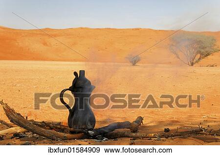 "Coffee pot during rest in the desert, Wahiba Sands, Oman, Middle East, Asia" View Large Photo Image Stock Photo - "Coffee pot during rest in the desert, Wahiba Sands, Oman, Middle East, Asia". Fotosearch