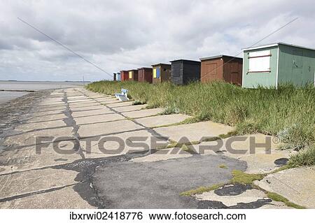 Stock Photograph - "Colorful beach huts on the dike at the North Sea, Dagebuell, North Frisia, Schleswig-Holstein, Germany, Europe". Fotosearch