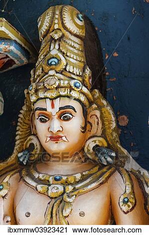 Stock Image - "Colorful Hindu statue, Srirangam temple complex, Tiruchirappalli, Tamil Nadu, India, Asia". Fotosearch