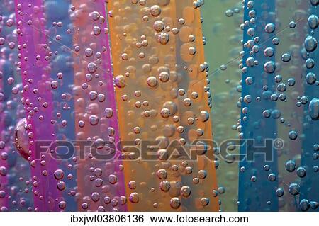 Stock Photograph - Colorful straws with air bubbles. Fotosearch