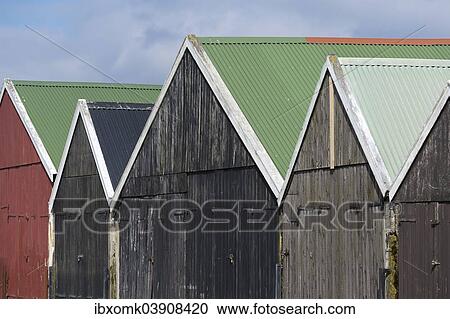 "Coloured boathouses, Suouroy, Faroe Islands, Denmark, Europe" View Large Photo Image Stock Image - "Coloured boathouses, Suouroy, Faroe Islands, Denmark, Europe". Fotosearch