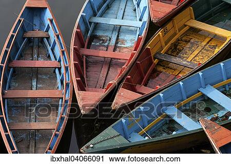 "Colourful boats on Phewa Lake, Phewa Tal or Fewa Lake, Pokhara, Nepal, Asia" View Large Photo Image Stock Image - "Colourful boats on Phewa Lake, Phewa Tal or Fewa Lake, Pokhara, Nepal, Asia". Fotosearch