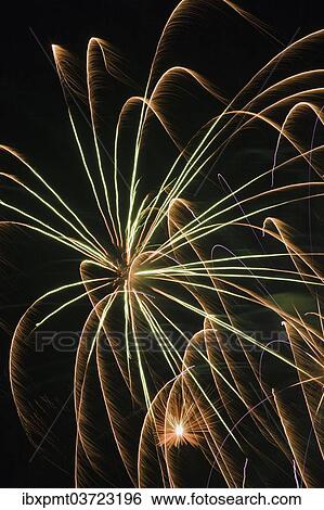 Colourful fireworks in the night sky View Large Photo Image Stock Photograph - Colourful fireworks in the night sky. Fotosearch