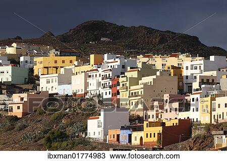 "Colourful houses on the outskirts of San Sebastian de La Gomera, Canary Islands, Spain, Europe" View Large Photo Image Stock Image - "Colourful houses on the outskirts of San Sebastian de La Gomera, Canary Islands, Spain, Europe". Fotosearch