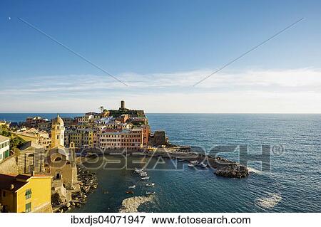 Stock Photo - "Colourful houses on the sea, Vernazza, Cinque Terre, UNESCO World Heritage Site, province of La Spezia, Liguria, Italy, Europe". Fotosearch