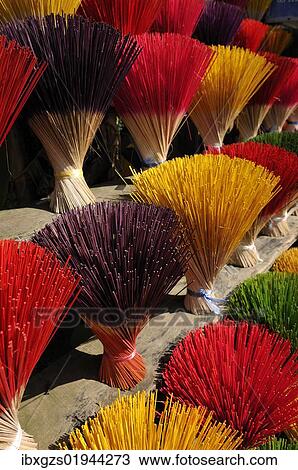 Stock Image - "Colourful incense sticks, Hue, Vietnam, Asia". Fotosearch