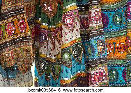 "Colourful skirts inlaid with mirrors and different patterns, detail, Udaipur, Rajasthan, India, Asia" View Large Photo Image Stock Photograph - "Colourful skirts inlaid with mirrors and different patterns, detail, Udaipur, Rajasthan, India, Asia". Fotosearch