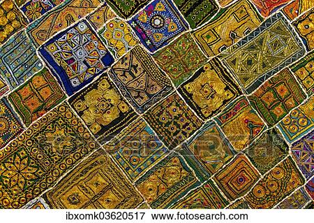 Stock Photo - "Colourful traditional wall hanging from Rajasthan, inlaid with small mirrors, Rajasthan, India, Asia". Fotosearch