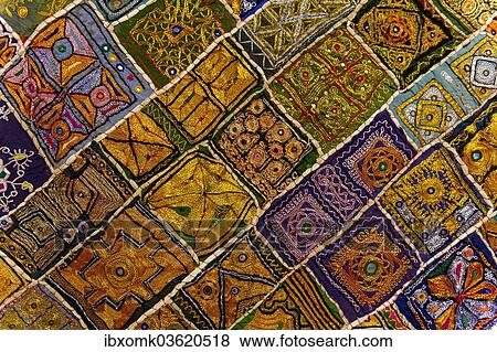 "Colourful traditional wall hanging from Rajasthan, inlaid with small mirrors, Rajasthan, India, Asia" View Large Photo Image Stock Photo - "Colourful traditional wall hanging from Rajasthan, inlaid with small mirrors, Rajasthan, India, Asia". Fotosearch