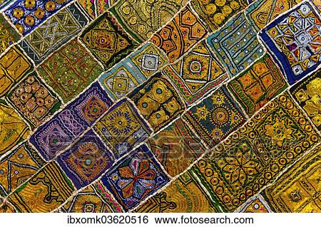 "Colourful traditional wall hanging from Rajasthan, inlaid with small mirrors, Rajasthan, India, Asia" View Large Photo Image Stock Photograph - "Colourful traditional wall hanging from Rajasthan, inlaid with small mirrors, Rajasthan, India, Asia". Fotosearch