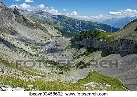 "Combe des Andins, a cirque en route to the Audannes mountain shelter, Bernese Alps, Canton of Valais, Switzerland, Europe" View Large Photo Image Stock Image - "Combe des Andins, a cirque en route to the Audannes mountain shelter, Bernese Alps, Canton of Valais, Switzerland, Europe". Fotosearch
