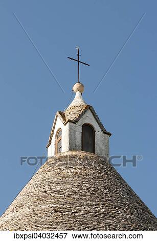 "Conical roof of Sant' Antonio Church, Alberobello, Apulia, Italy, Europe" View Large Photo Image Stock Photo - "Conical roof of Sant' Antonio Church, Alberobello, Apulia, Italy, Europe". Fotosearch