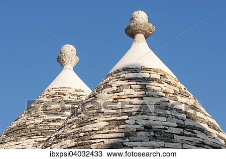 "Conical roofs and pinnacles of Trullo houses, Trulli District, Alberobello, Apulia, Italy, Europe" View Large Photo Image Stock Image - "Conical roofs and pinnacles of Trullo houses, Trulli District, Alberobello, Apulia, Italy, Europe". Fotosearch
