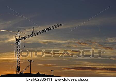 "Construction crane against an evening sky, Baden-Wuerttemberg, Germany, Europe" View Large Photo Image Stock Image - "Construction crane against an evening sky, Baden-Wuerttemberg, Germany, Europe". Fotosearch