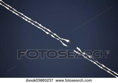 "Contrails with an interruption, Germany, Europe" View Large Photo Image Stock Photo - "Contrails with an interruption, Germany, Europe". Fotosearch