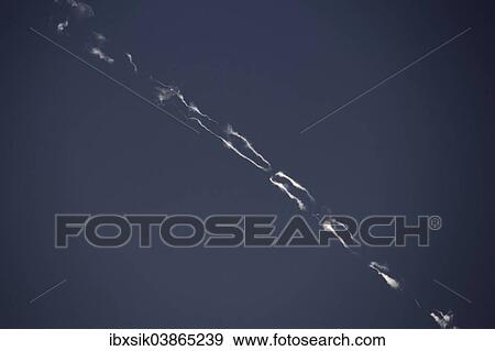 "Contrails with interruptions, Germany, Europe" View Large Photo Image Stock Photo - "Contrails with interruptions, Germany, Europe". Fotosearch