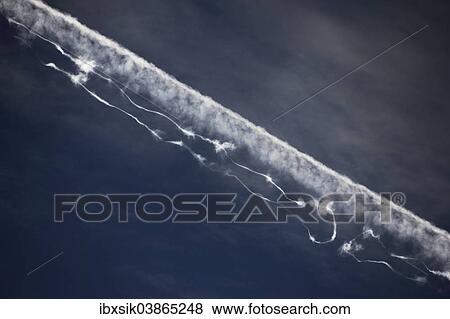Stock Photo - "Contrails with interruptions, Germany, Europe". Fotosearch