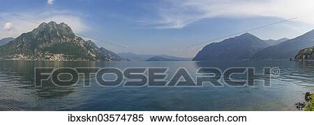 Stock Photography - "Corna Trentapassi, 1248m, and Monte Isola island in Lake Iseo or Lago d'Iseo, Riva di Solto, Bergamo, Italy, Europe". Fotosearch