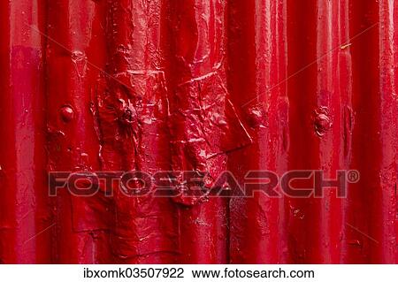 "Corrugated iron, painted red, partially repaired" View Large Photo Image Stock Image - "Corrugated iron, painted red, partially repaired". Fotosearch