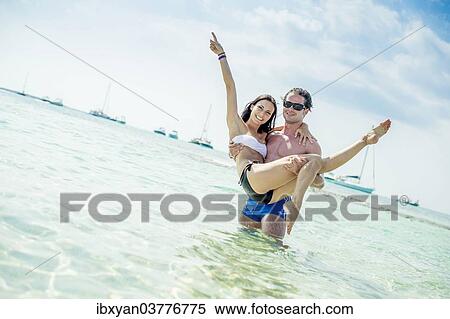 "Couple in the sea, Ibiza, Spain, Europe" View Large Photo Image Stock Photography - "Couple in the sea, Ibiza, Spain, Europe". Fotosearch