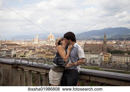 "Couple kissing against the backdrop of Florence, Italy, Europe" View Large Photo Image Stock Photo - "Couple kissing against the backdrop of Florence, Italy, Europe". Fotosearch