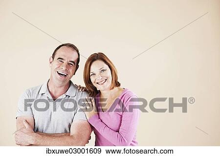 Stock Photo - "Couple smiling, Mannheim, Baden-Wurttemberg, Germany, Europe". Fotosearch