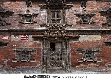 Stock Image - "Courtyard with ornaments on doors and windows, Kumari Bahal, Durbar Square, Kathmandu, UNESCO World Heritage Site, Nepal, Asia". Fotosearch