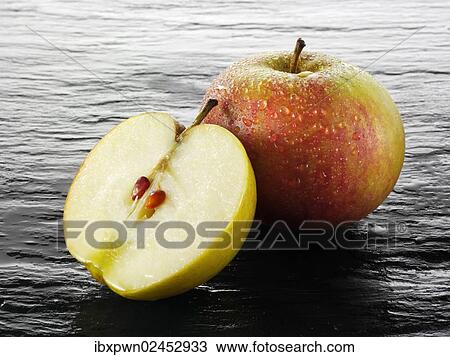 "Cox apples, whole and cut" View Large Photo Image Stock Image - "Cox apples, whole and cut". Fotosearch