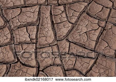 "Cracked dry soil of a riverbed, Argentinian Andes, Uspallata, Mendoza province, Argentina, South America, America, South America" View Large Photo Image Stock Photo - "Cracked dry soil of a riverbed, Argentinian Andes, Uspallata, Mendoza province, Argentina, South America, America, South America". Fotosearch