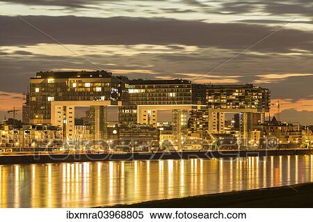 Stock Photography - "Crane Houses on the Rhine, dusk, Cologne, North Rhine-Westphalia, Germany, Europe". Fotosearch