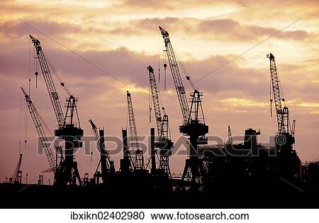 "Cranes, silhouettes in the evening light, shipyard, port of Hamburg, Hamburg, Germany, Europe" View Large Photo Image Stock Image - "Cranes, silhouettes in the evening light, shipyard, port of Hamburg, Hamburg, Germany, Europe". Fotosearch