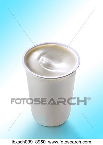 Creamy yogurt in a white cup View Large Photo Image Stock Image - Creamy yogurt in a white cup. Fotosearch