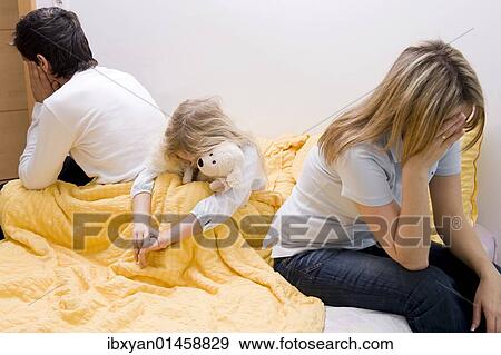 "Crisis in parent's relationship, daughter suffering from it" View Large Photo Image Stock Photo - "Crisis in parent's relationship, daughter suffering from it". Fotosearch