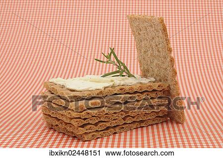 "Crispbread with cream cheese, on a checkered tablecloth" View Large Photo Image Stock Image - "Crispbread with cream cheese, on a checkered tablecloth". Fotosearch