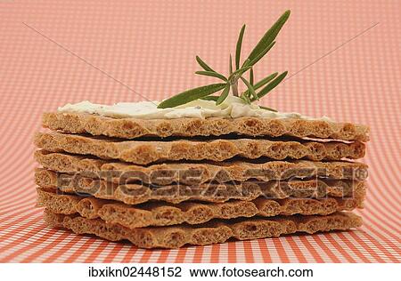 "Crispbread with cream cheese, on a checkered table cloth" View Large Photo Image Stock Image - "Crispbread with cream cheese, on a checkered table cloth". Fotosearch