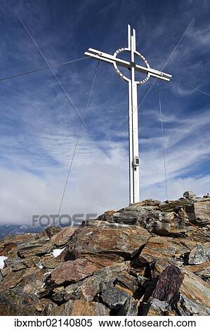 "Cross on the Zufrittspitze summit in the Ultental above Lake Weissenbrunn, South Tyrol, Italy, Europe" View Large Photo Image Stock Photography - "Cross on the Zufrittspitze summit in the Ultental above Lake Weissenbrunn, South Tyrol, Italy, Europe". Fotosearch