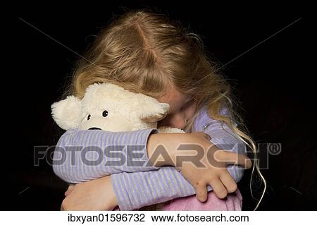 "Crouching girl, symbolic image for child abuse" View Large Photo Image Stock Image - "Crouching girl, symbolic image for child abuse". Fotosearch