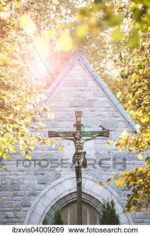 Stock Photo - "Crucifix at old church, cemetery in Stockholm, Sweden, Europe". Fotosearch