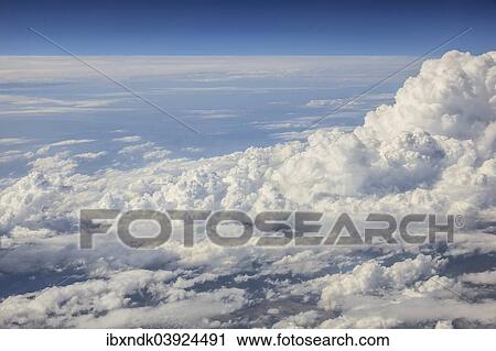 "Cumulus clouds, aerial view" View Large Photo Image Stock Image - "Cumulus clouds, aerial view". Fotosearch