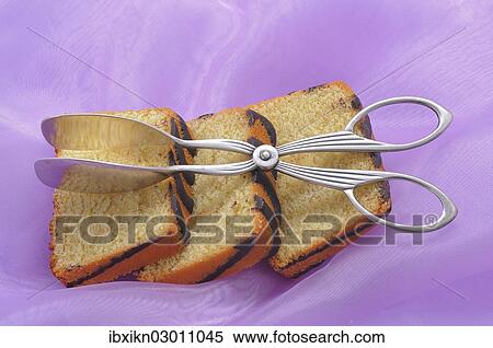 "Cup cakes, cake slices andSlices of ring cake with cake tongs" View Large Photo Image Stock Photography - "Cup cakes, cake slices andSlices of ring cake with cake tongs". Fotosearch
