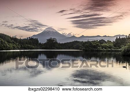 "Currently inactive volcano, Mt Egmont, Mt Taranaki, reflections in Lake Mangamahoe reservoir, dam, North Island, New Zealand, Oceania" View Large Photo Image Stock Image - "Currently inactive volcano, Mt Egmont, Mt Taranaki, reflections in Lake Mangamahoe reservoir, dam, North Island, New Zealand, Oceania". Fotosearch