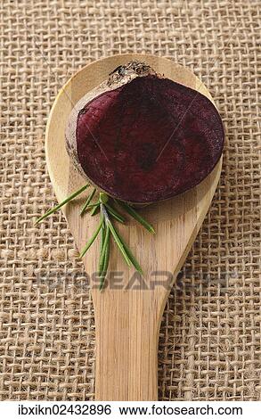 "Cut beetroot, on a wooden spoon" View Large Photo Image Stock Photograph - "Cut beetroot, on a wooden spoon". Fotosearch