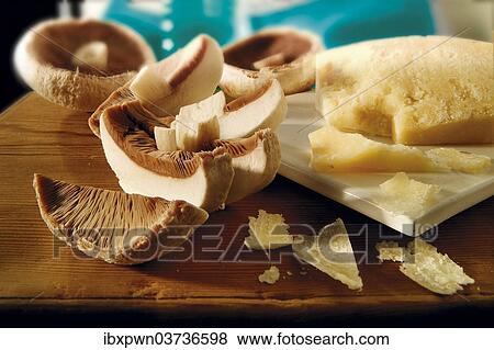 Cut mushrooms and cheese View Large Photo Image Stock Photo - Cut mushrooms and cheese. Fotosearch
