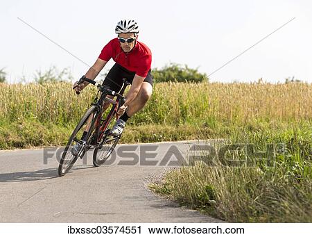 "Cyclist, 44 years, riding a racing cycle, Winterbach, Baden-Wurttemberg, Germany, Europe" View Large Photo Image Stock Image - "Cyclist, 44 years, riding a racing cycle, Winterbach, Baden-Wurttemberg, Germany, Europe". Fotosearch