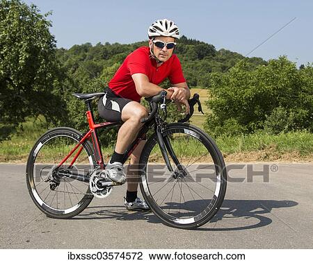 "Cyclist, 44 years, with a racing cycle, Winterbach, Baden-Wurttemberg, Germany, Europe" View Large Photo Image Stock Image - "Cyclist, 44 years, with a racing cycle, Winterbach, Baden-Wurttemberg, Germany, Europe". Fotosearch
