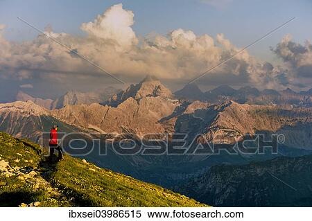 "Dark clouds above the Allgau Alps with mountain hiker, Oberstdorf, Bavaria, Germany, Europe" View Large Photo Image Stock Photography - "Dark clouds above the Allgau Alps with mountain hiker, Oberstdorf, Bavaria, Germany, Europe". Fotosearch