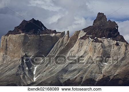 "Dark peaks, Cuernos del Paine granite mountains, Torres del Paine National Park, Lake Pehoe, Magallanes Antarctica region, Patagonia, Chile, South America, America, South America" View Large Photo Image Stock Photo - "Dark peaks, Cuernos del Paine granite mountains, Torres del Paine National Park, Lake Pehoe, Magallanes Antarctica region, Patagonia, Chile, South America, America, South America". Fotosearch