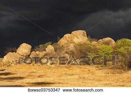 "Dark storm front over rocks, Kaokoland, Kunene, Namibia, Africa" View Large Photo Image Stock Photo - "Dark storm front over rocks, Kaokoland, Kunene, Namibia, Africa". Fotosearch